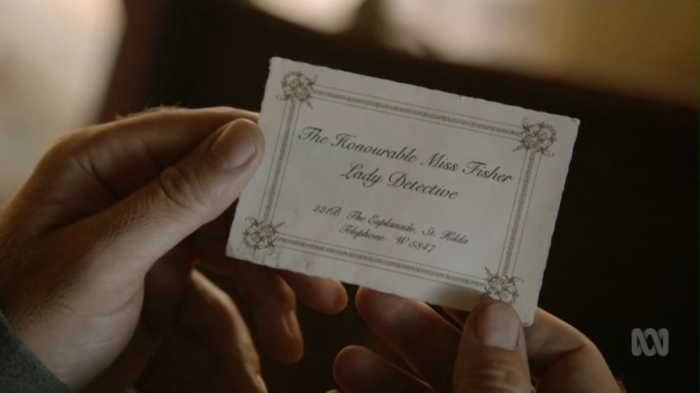 Miss Fisher's business card.